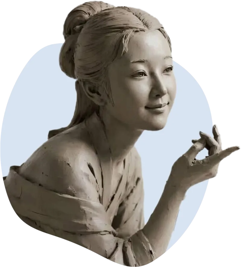 Clay sculpture of a smiling woman holding up a gold star