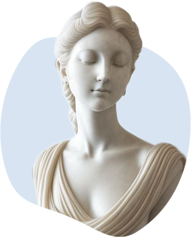 Marble bust of a serene woman with her eyes lowered and her hair braided back, in a pleated drape